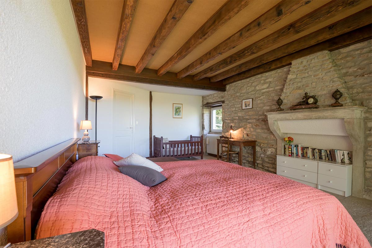 The master bedroom and its beautiful fireplace