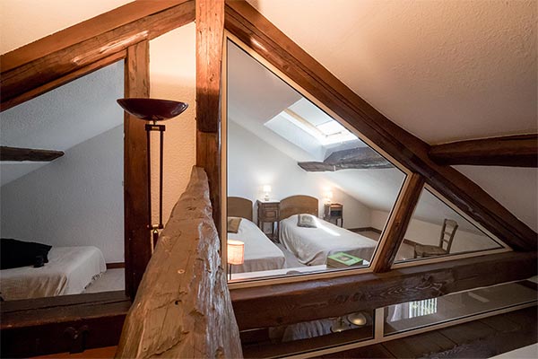 The bedroom seen from the games room