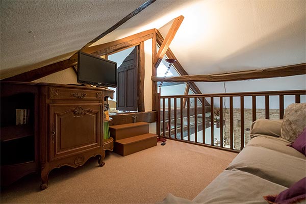 The bathroom has a shower and a bath